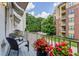Outdoor balcony with chairs and a view of the neighborhood at 328 Stonemont Dr, Atlanta, GA 30305