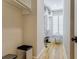 Walk-in closet with custom shelving, storage and bench near a bright window at 328 Stonemont Dr, Atlanta, GA 30305