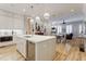 This modern kitchen features an island with seating, stainless steel appliances, and an open layout at 328 Stonemont Dr, Atlanta, GA 30305