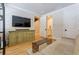 Living room with hardwood floors, TV, and decorative furnishings at 328 Stonemont Dr, Atlanta, GA 30305