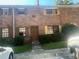 Charming brick townhome with well-maintained landscaping and inviting entrance at 6354 Shannon Pkwy # 12D, Union City, GA 30291