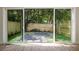 Bright interior view of the backyard, highlighting a private outdoor space with a modern fence and landscaping at 1631 Overlook Nw Way # 2, Atlanta, GA 30318