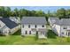 Well-manicured backyard highlights the home's stylish exterior and inviting outdoor space at 13568 Whitman Lane, Covington, GA 30014