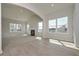 Spacious living room with fireplace, large windows and hardwood flooring at 500 Charleston Pl, Villa Rica, GA 30180