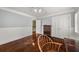 Neutral bedroom features a ceiling fan, hardwood floors, and ample closet space with natural light at 2166 Tanglewood Dr, Snellville, GA 30078