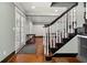 Spacious entryway showcasing hardwood floors and a staircase at 2166 Tanglewood Dr, Snellville, GA 30078