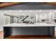 Open concept kitchen with a large island and modern appliances at 2166 Tanglewood Dr, Snellville, GA 30078