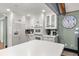 Bright kitchen with white cabinetry and modern appliances at 2166 Tanglewood Dr, Snellville, GA 30078