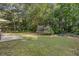 Spacious backyard with a patio, outdoor dining set, and a trampoline at 2505 Hamilton Parc Ln, Buford, GA 30519