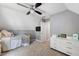 Neutral-colored bedroom with soft carpet, gray accent, and ample storage; perfect for relaxation at 2505 Hamilton Parc Ln, Buford, GA 30519