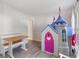 Playroom or bedroom featuring a toy castle, table and bench at 2505 Hamilton Parc Ln, Buford, GA 30519