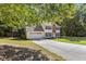 Lovely two-story home with a two-car garage and well-maintained lawn and landscaping at 2505 Hamilton Parc Ln, Buford, GA 30519