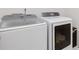 Bright laundry room with Samsung washer and dryer units, perfect for efficient chores at 2505 Hamilton Parc Ln, Buford, GA 30519