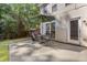 Outdoor dining area with a patio table, umbrella, and a grill at 2505 Hamilton Parc Ln, Buford, GA 30519