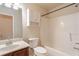 Bathroom with a combined shower and tub, vanity sink, and toilet at 3019 Iona Ct, Snellville, GA 30039
