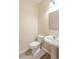Charming half-bathroom featuring a pedestal sink at 3019 Iona Ct, Snellville, GA 30039