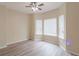 Cozy bedroom featuring wood floors, large windows, and ample natural light at 3019 Iona Ct, Snellville, GA 30039