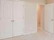Spacious bedroom closet with double white doors provides ample storage space at 3019 Iona Ct, Snellville, GA 30039