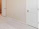 Bedroom with neutral walls and carpeting, showcasing the spaciousness of the home at 3019 Iona Ct, Snellville, GA 30039