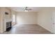 Spacious living room features hardwood floors and a fireplace at 3019 Iona Ct, Snellville, GA 30039