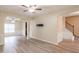 Spacious living room with wood flooring, archways, and natural light at 3019 Iona Ct, Snellville, GA 30039