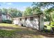 This home offers a private backyard with fencing, greenery, and ample space for outdoor activities at 3436 Adkins Nw Rd, Atlanta, GA 30331