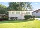 Charming, freshly painted one-story home with well-maintained lawn and mature landscaping at 3436 Adkins Nw Rd, Atlanta, GA 30331
