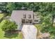 Aerial view of a well maintained home with a beautiful lawn and landscaping at 114 Arborwood Way, Temple, GA 30179