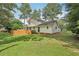 Spacious backyard offering ample green space and outdoor potential at 1651 King Rd, Riverdale, GA 30296