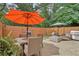Inviting patio with seating, outdoor dining, and a grill perfect for entertaining at 1651 King Rd, Riverdale, GA 30296