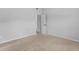 Well-lit carpeted bedroom features a closet and ample space for personalization at 149 Elkins Blvd, Locust Grove, GA 30248