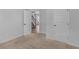 Bedroom features neutral carpeting, painted walls, with interior door to the hallway at 149 Elkins Blvd, Locust Grove, GA 30248