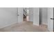 Bedroom features neutral carpeting, painted walls, with interior door to the hallway and closet at 149 Elkins Blvd, Locust Grove, GA 30248