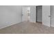 A bright bedroom with a closet and open door leading to the second floor at 149 Elkins Blvd, Locust Grove, GA 30248