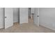 The upstairs hallway view includes an open closet, the bathroom, and another bedroom at 149 Elkins Blvd, Locust Grove, GA 30248