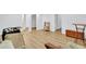 Bright and open basement area featuring wood floors and neutral walls at 11739 Sawgrass Ct, Fayetteville, GA 30215
