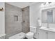 Well lit bathroom showcasing stand up shower with tile surround and recessed niche at 11739 Sawgrass Ct, Fayetteville, GA 30215