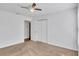 Spacious bedroom featuring carpeted floors, closet, and a ceiling fan at 11739 Sawgrass Ct, Fayetteville, GA 30215