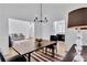 Open dining room with views to living room and kitchen at 11739 Sawgrass Ct, Fayetteville, GA 30215