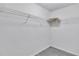 Walk-in closet featuring wire shelving system, offering ample storage space at 11739 Sawgrass Ct, Fayetteville, GA 30215