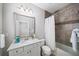 Stylish bathroom featuring a modern vanity, a shower with curtain and decorative mirror at 1618 Durden Ne Rd, Atlanta, GA 30319
