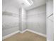 Spacious walk-in closet with built-in shelving and ample storage space at 1618 Durden Ne Rd, Atlanta, GA 30319
