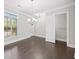 Bright dining room with hardwood floors, large window and view to the outside at 1618 Durden Ne Rd, Atlanta, GA 30319