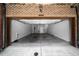 Spacious two-car garage featuring lighting, clean flooring, and ample space for vehicles at 1618 Durden Ne Rd, Atlanta, GA 30319