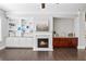 Open living space boasts hardwood floors, fireplace, and built-in shelving at 1618 Durden Ne Rd, Atlanta, GA 30319