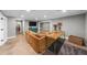 Finished basement with gray walls, a comfortable seating area, and a rustic console table at 4020 High Gables E, Cumming, GA 30041