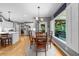 Charming breakfast area with a view of the deck, kitchen with stainless appliances and an open layout at 4020 High Gables E, Cumming, GA 30041