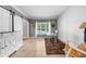 Bright and airy living room featuring a cozy rug, rocking chair, and lots of natural light at 4020 High Gables E, Cumming, GA 30041