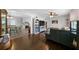 Cozy living room featuring hardwood floors, neutral walls, and an open floor plan at 506 Bolijeri Blvd, Villa Rica, GA 30180