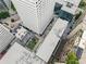 An aerial view of the property with modern building and colorful playground at 145 15Th Ne St # 826, Atlanta, GA 30309